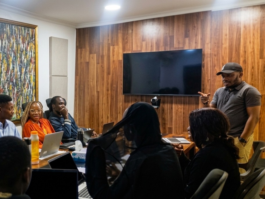 A PrimaCX facilitator presenting to a multicultural client team during a service excellence engagement